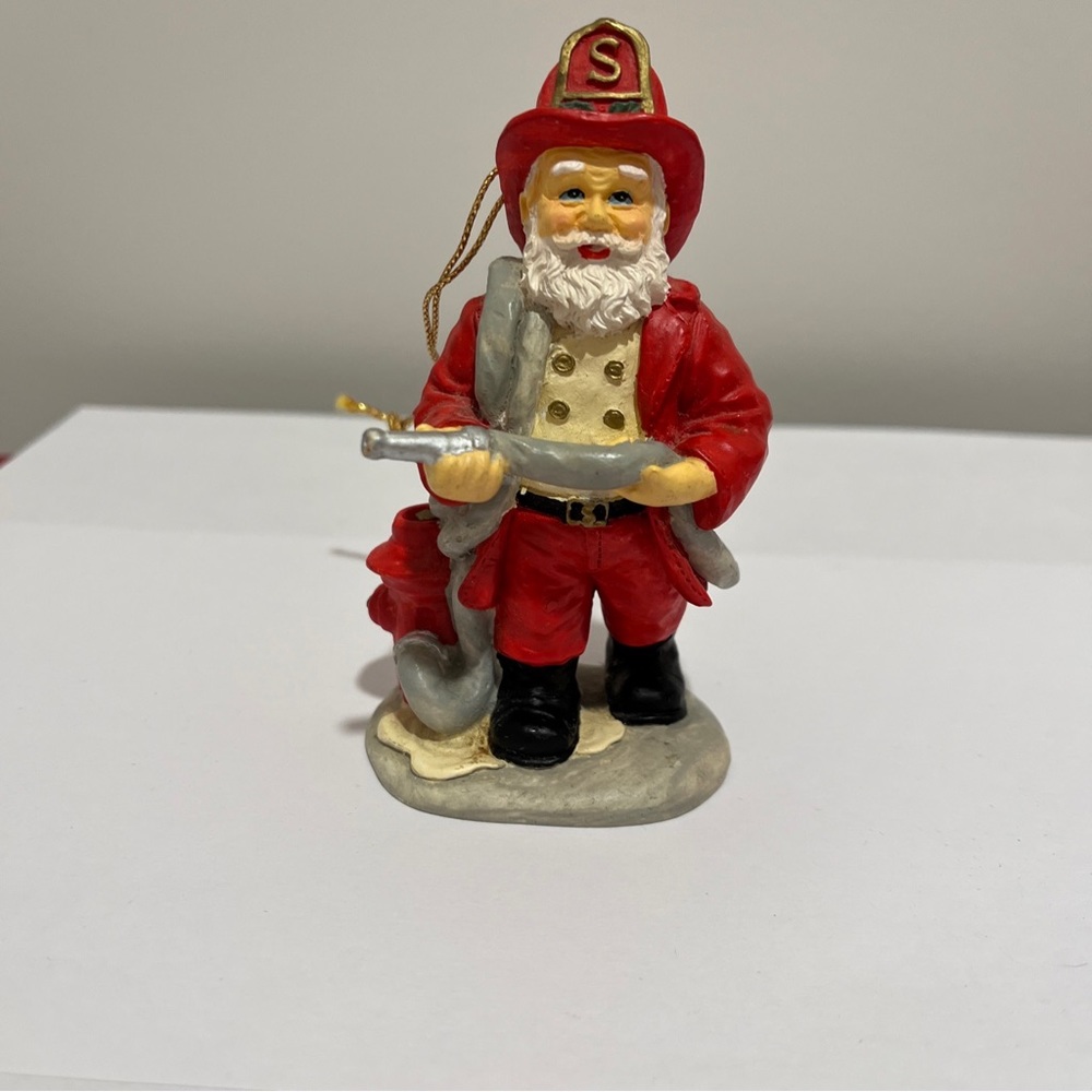 Vintage Santa Claus Firefighter with Fire Hose Christmas Ornament